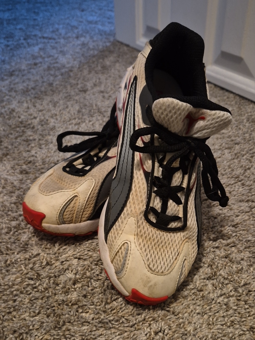 Puma Boy's White and Black Athletic Shoes with Red Accents